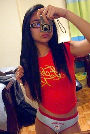 Cute Asian teen with glasses..