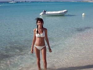 Hot girl in white bikini posing
