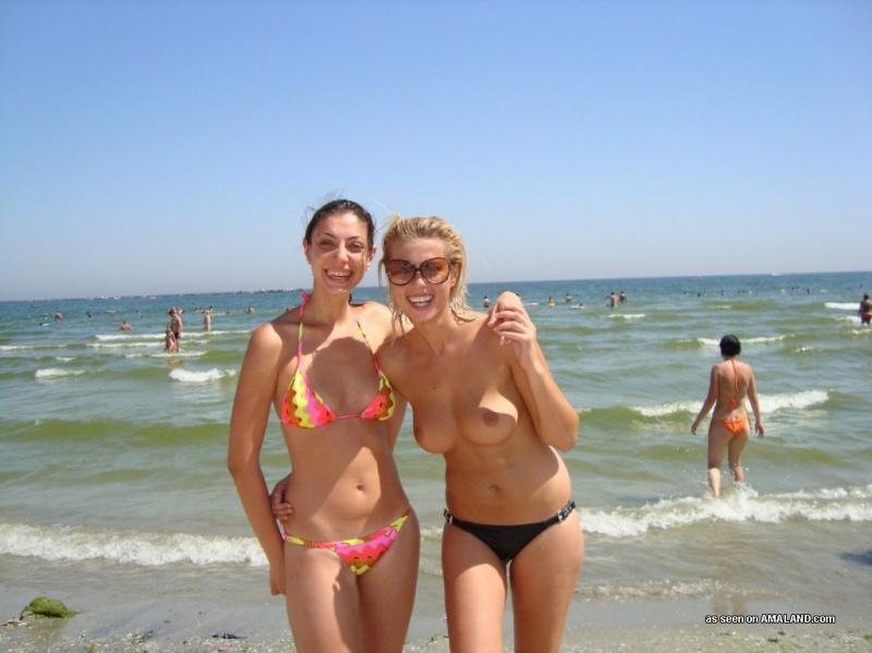 Romanian girl having topless fun at the beach pic