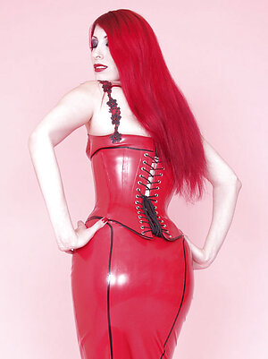 redhead strips off corset and